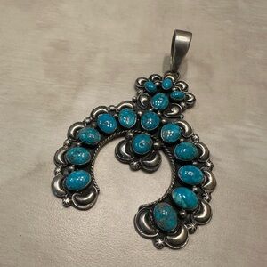 Squash blossom pendant.